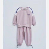 ست دورس و شلوار جاگر بچگانه توکرک رنگ یاسی مناسب 2 تا 6 سال