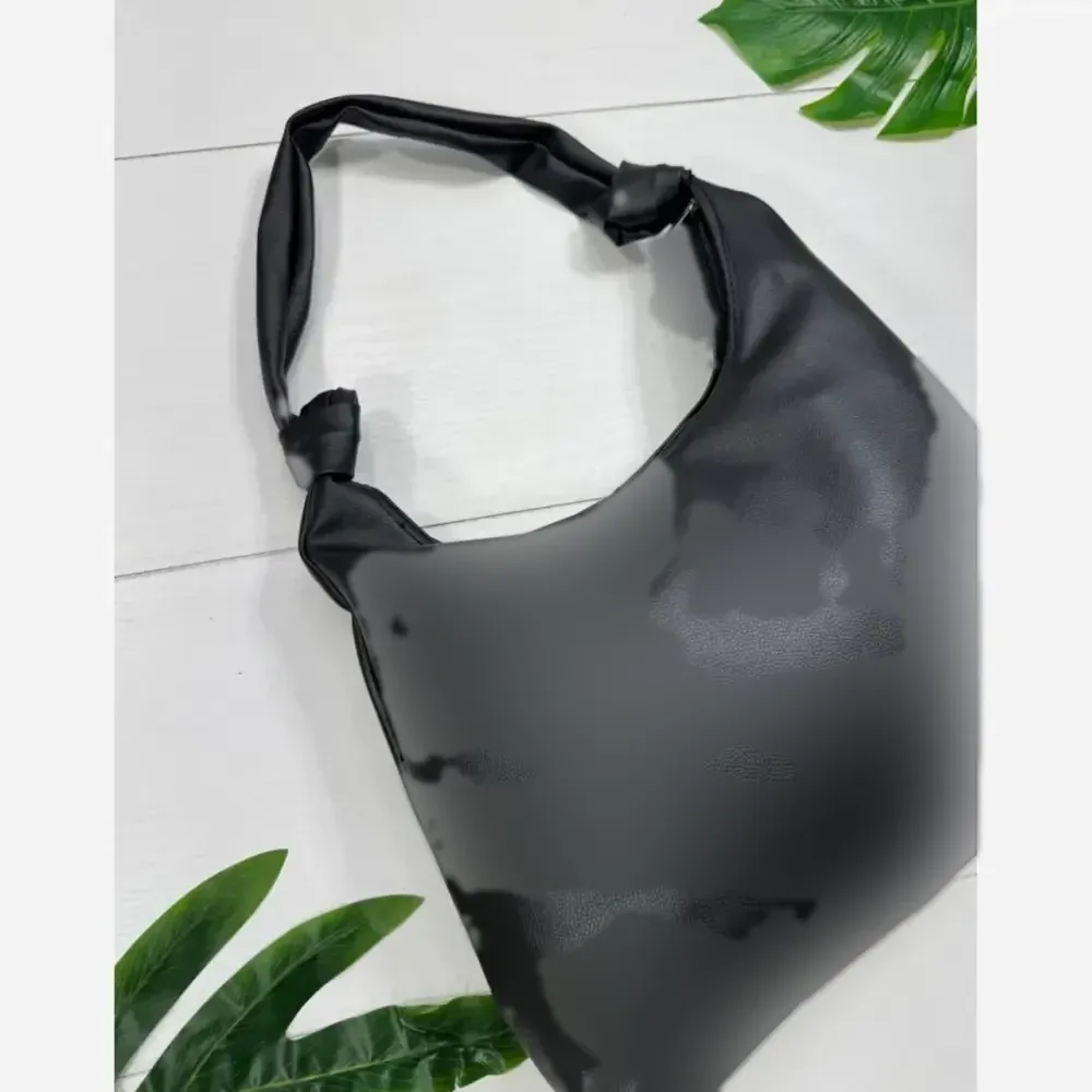 کیف بند گره ای چرم سبک و جادار رنگ مشکی و موکا
