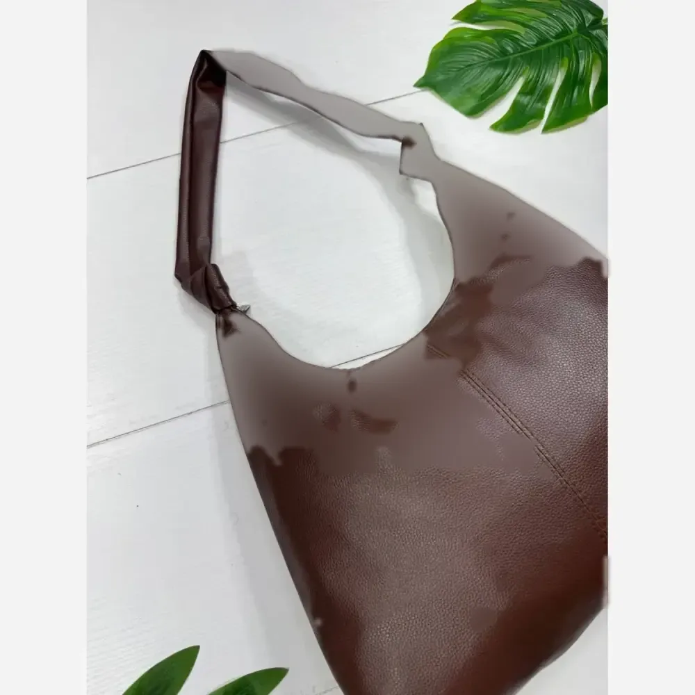 کیف بند گره ای چرم سبک و جادار رنگ مشکی و موکا